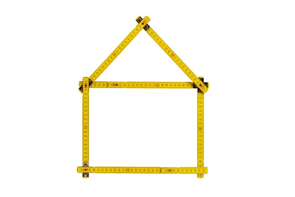 家の形で折られたヤード尺 — ストック写真