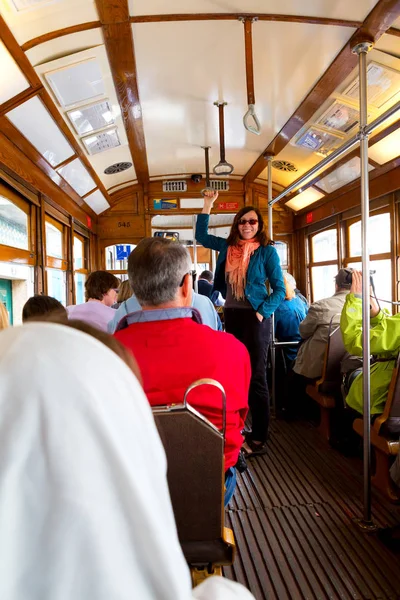 Lisbon, Portugal - 04 17 2015: tourists inside of a vintage carr — Stock Photo, Image