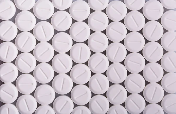 Many white pills — Stock Photo, Image