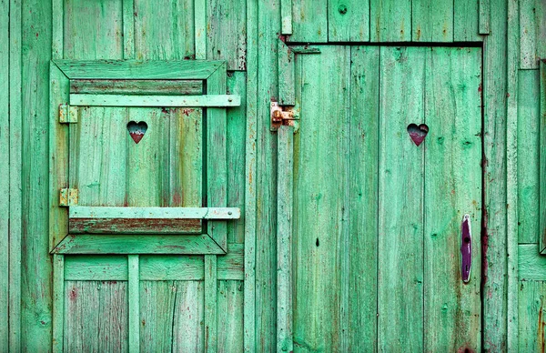 Zielony stare drewniane drzwi i okna — Zdjęcie stockowe