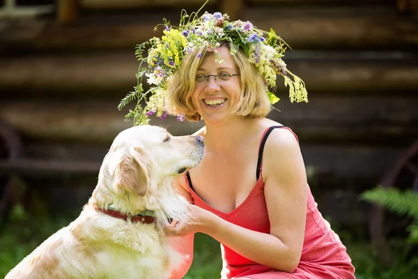 Young woman with a dog — Stock Photo, Image