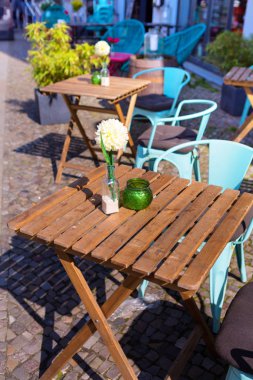 european restaurant - tables and chairs on the street