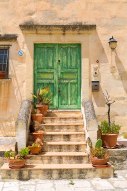 old italian house with green door