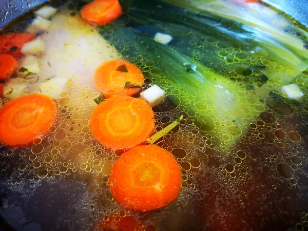 Chicken soup in a pot — Stock Photo, Image