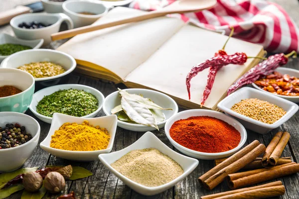 Various spices and blank cookbook. — Stock Photo, Image