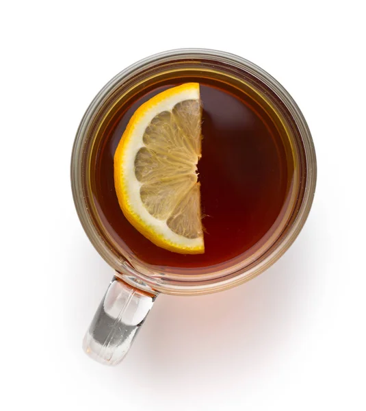 Чай у скляній чашці з нарізаним лимоном . — стокове фото