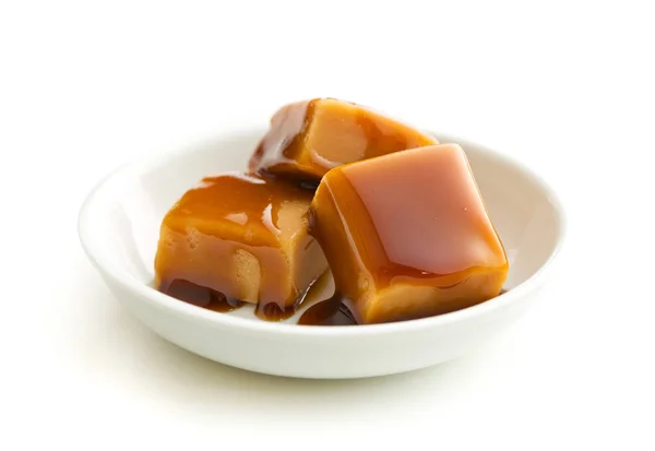 Caramelle caramellate con salsa al caramello . — Foto Stock