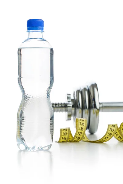 Bottle water and dumbbell. — Stock Photo, Image