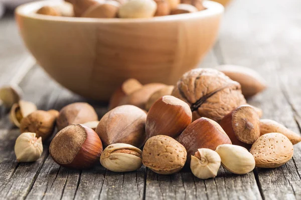 Different types of nuts in the nutshell. — Stock Photo, Image