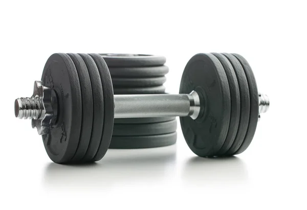 The metal dumbbell and weights. — Stock Photo, Image