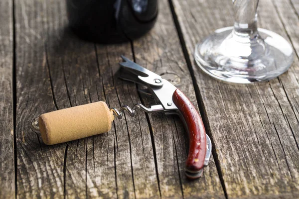 Corkscrew and cork. — Stock Photo, Image