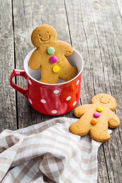 Gingerbread man in mug. — Stock Photo, Image