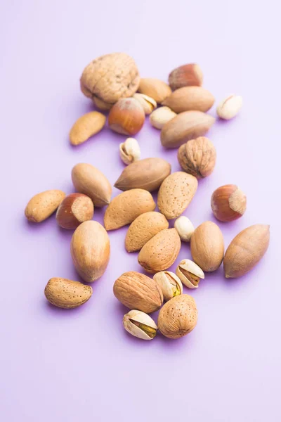 Different types of nuts in the nutshell. — Stock Photo, Image