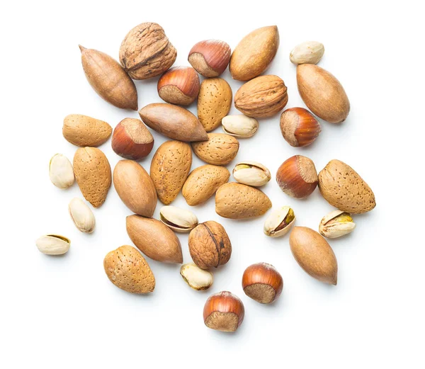 Diferentes tipos de frutos secos en la cáscara de nuez . — Foto de Stock