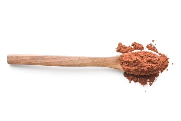 Sabroso cacao en polvo en cuchara de madera . — Foto de Stock