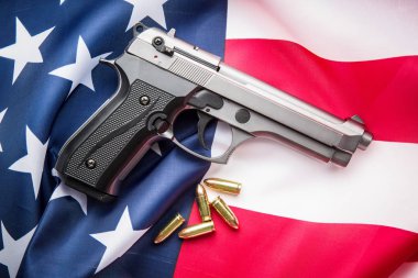 Pistol bullets, handgun and USA flag. clipart