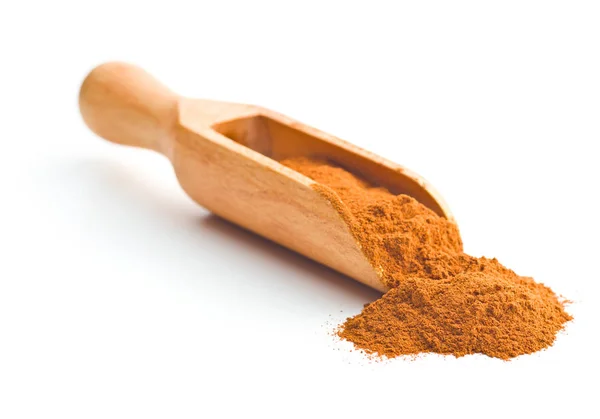 Cinnamon powder in scoop. — Stock Photo, Image