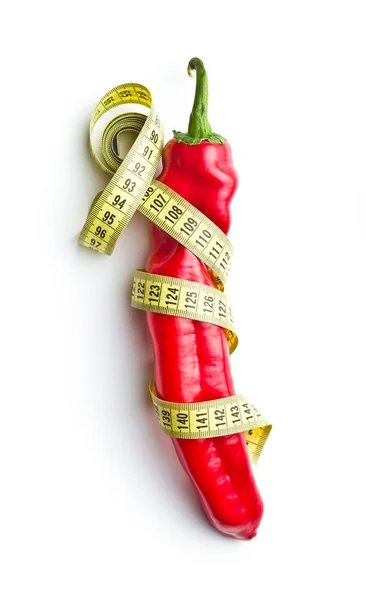 Red pepper and measuring tape. — Stock Photo, Image