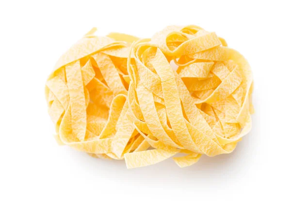 Rå tagliatelle pasta. — Stockfoto