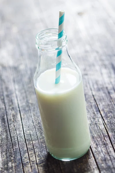 Bottle milk with straw. — Stock Photo, Image