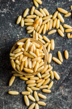 Healthy pine nuts. clipart