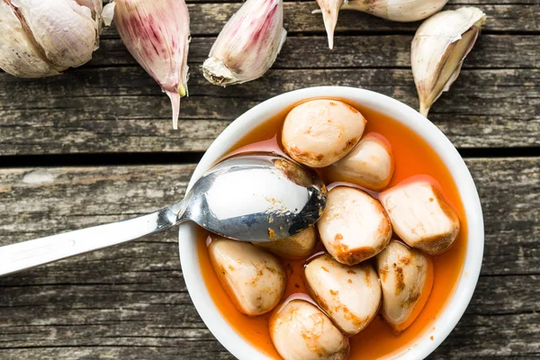 Tasty preserved garlic. — Stock Photo, Image