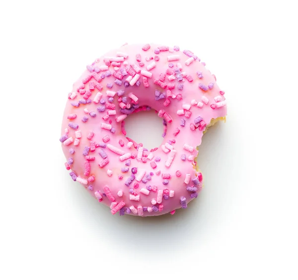 Rosa bitten donut. — Stockfoto