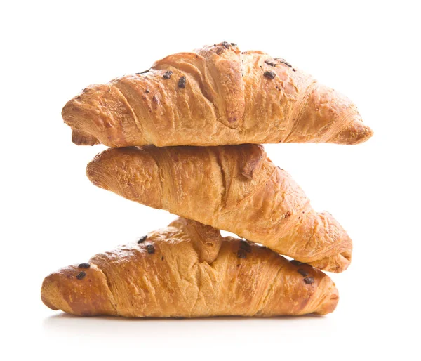 Three croissants with chocolate crumbs. — Stock Photo, Image