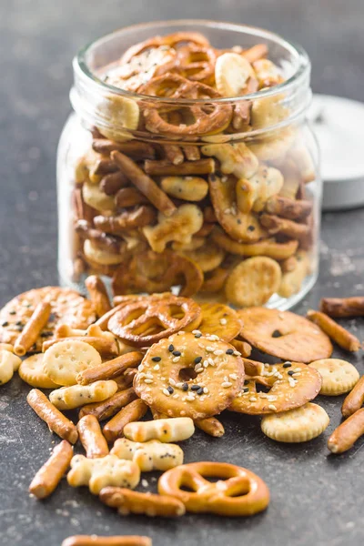 Mixed salty snack crackers and pretzels. — Stock Photo, Image