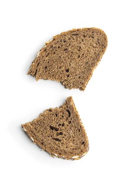 Pan de grano entero en rodajas con copos de avena. Pan integral. —  Fotos de Stock