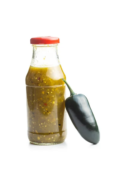 Green jalapeno peppers and tabasco sauce. — Stock Photo, Image