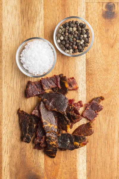 Beef jerky pieces. Dried beef meat. — Stock Photo, Image