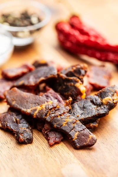 Beef jerky pieces. Dried beef meat. — Stock Photo, Image