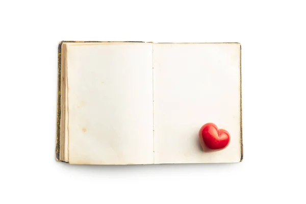 Love concept. Heart on open vintage book. — 스톡 사진