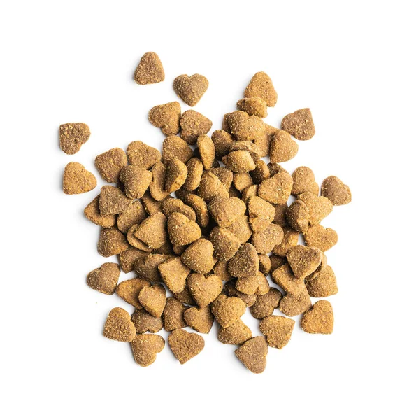 Dried kibble pet food. Heart shape dried animal food isolated on white background.