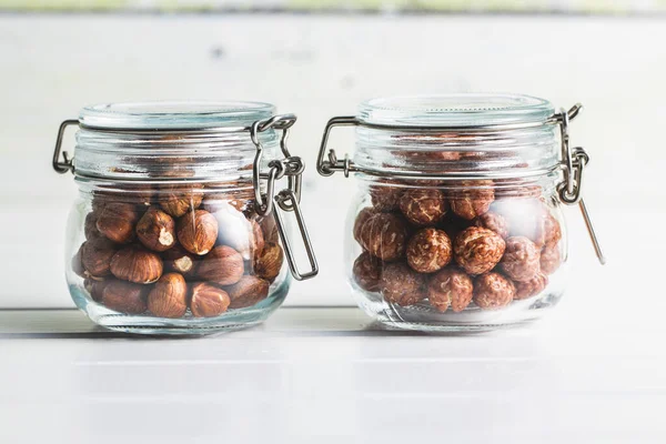 Hazelnuts Sugar Icing Jar White Table — Stock Photo, Image