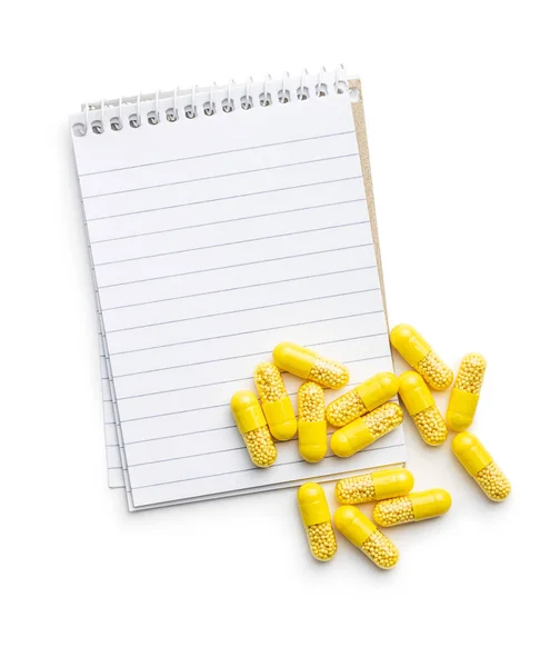 Vitamine Capsules Vitamine Pillen Notebook Geïsoleerd Witte Achtergrond — Stockfoto