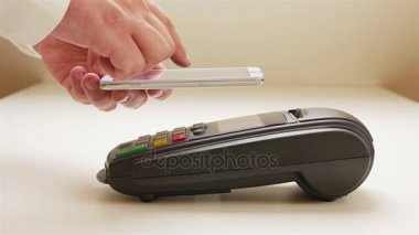Bir smartphone aygıt ile ödeme
