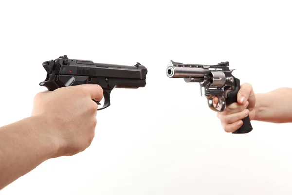 Two white hands hold gun isolated on white background — Stock Photo, Image