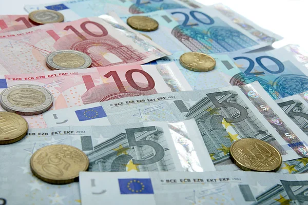 Peníze mince a bankovky eura — Stock fotografie