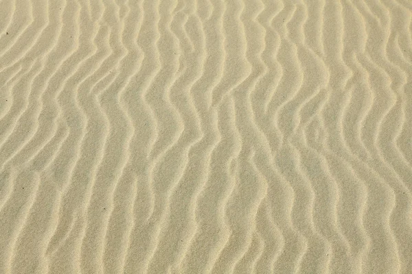 Υφή άμμου. Καφέ άμμος. Ιστορικό από λεπτή άμμο. — Φωτογραφία Αρχείου