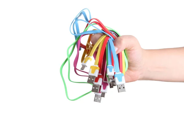 Počítačové kabely v ruce izolované na bílém pozadí — Stock fotografie