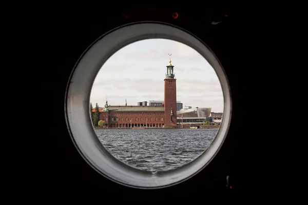 City Hall in Stockholm, Scandinavia, Sweden, Europe view from the porthole of the ship — Stock Photo, Image