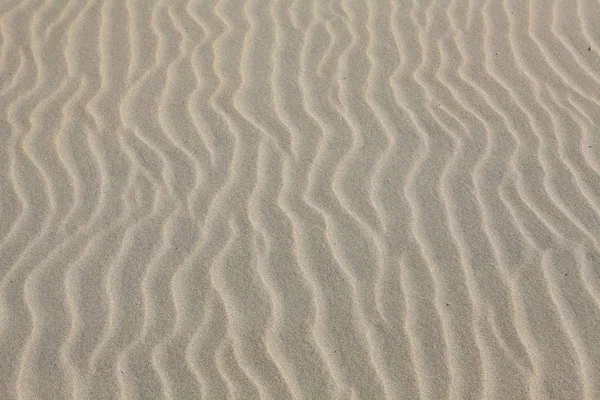 Κύματα άμμο στην παραλία — Φωτογραφία Αρχείου