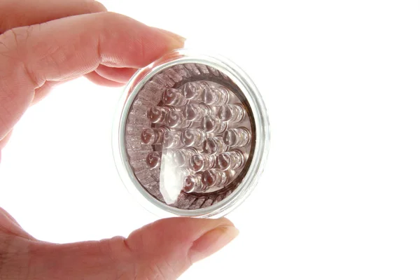 LED Żarówka w kobiecej dłoni na tle — Zdjęcie stockowe