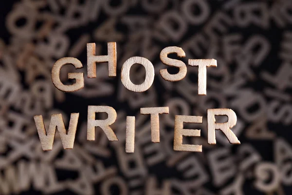 Ghostwriter text in wooden letters — Stock Photo, Image