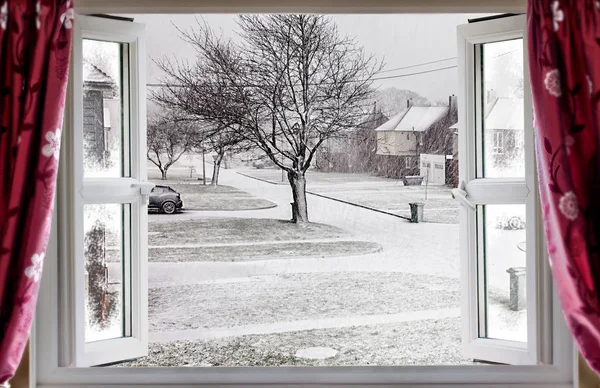 Beautiful winter scene through an open window — Stock Photo, Image