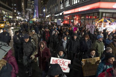 New York, NY - December 17, 2019: Few hundreds people rally in support of impeachment of President Trump from Times Square to Union Square along Broadway