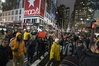 New York, NY - December 17, 2019: Few hundreds people rally in support of impeachment of President Trump from Times Square to Union Square along Broadway