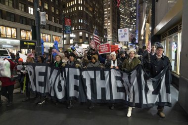 New York, NY - December 17, 2019: Few hundreds people rally in support of impeachment of President Trump from Times Square to Union Square along Broadway